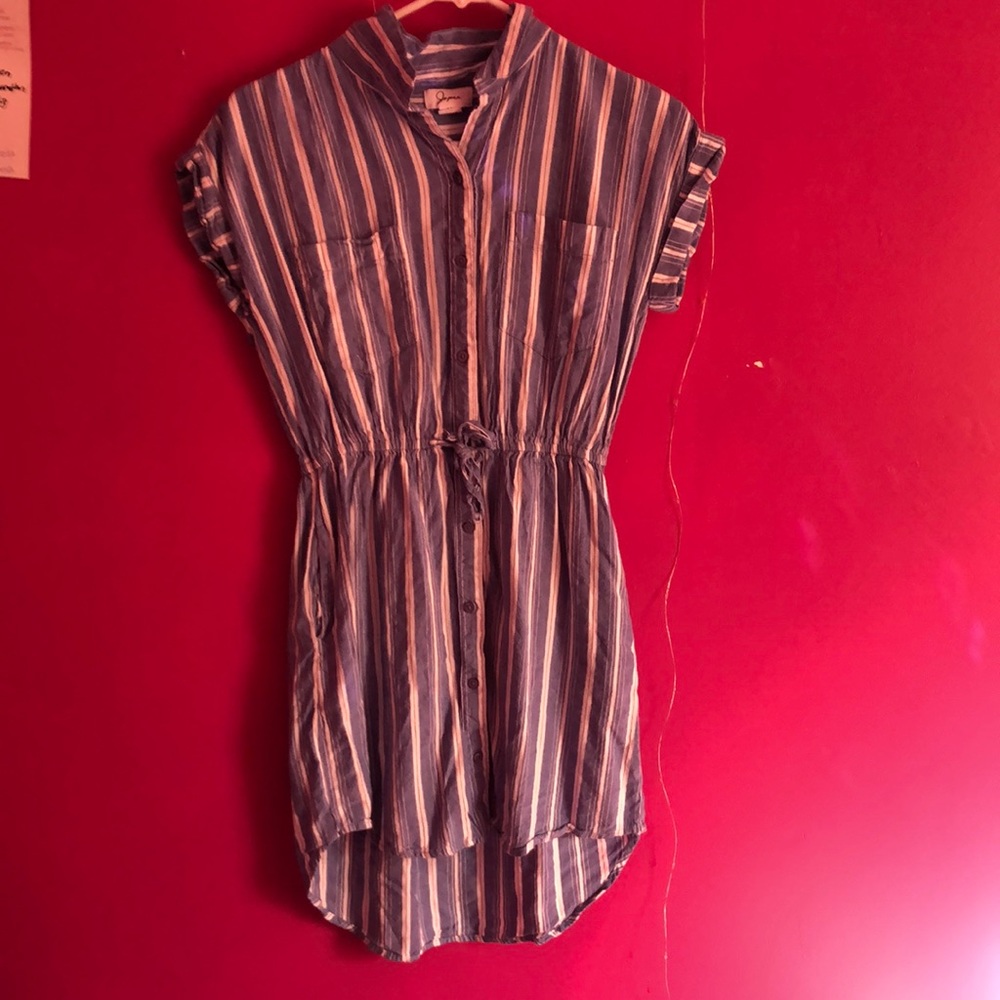 Size M and is light blue and white with stripes